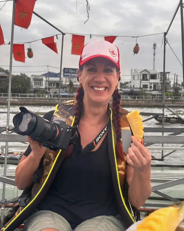 Philippa with her camera in Vietnam
