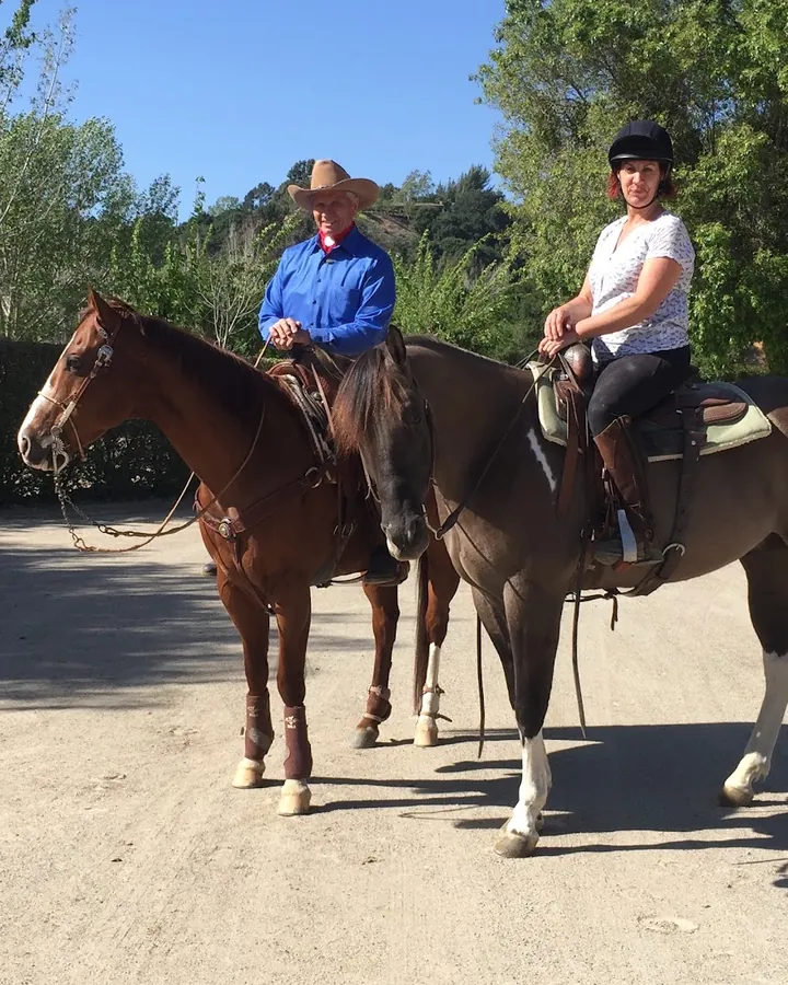 Philippa Armsby-Ward riding with Monty Roberts